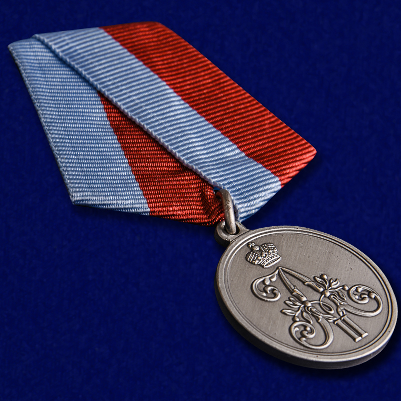 Внешний вид Александровской медали "1 марта" с колодкой